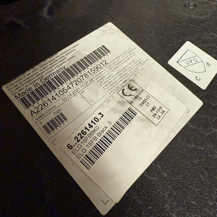 6980907
