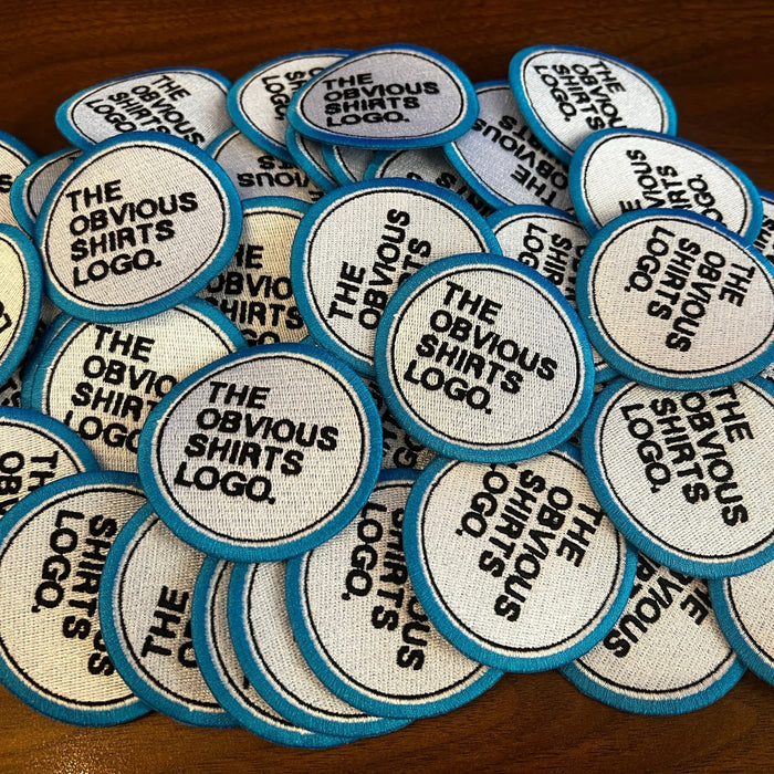 OBVIOUS SHIRTS EMBROIDERED LOGO PATCH. - OBVIOUS SHIRTS